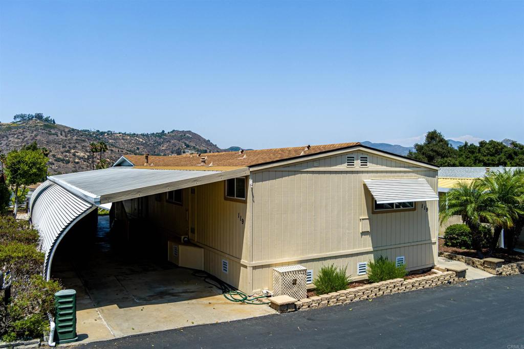 a aerial view of a house with a garage