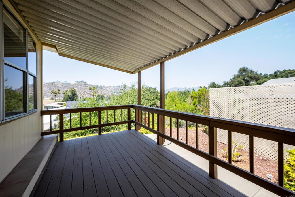 4650 Dulin Road, Unit 119 Fallbrook, CA 92003 - Photo 39 of 49 a view of balcony with wooden floor