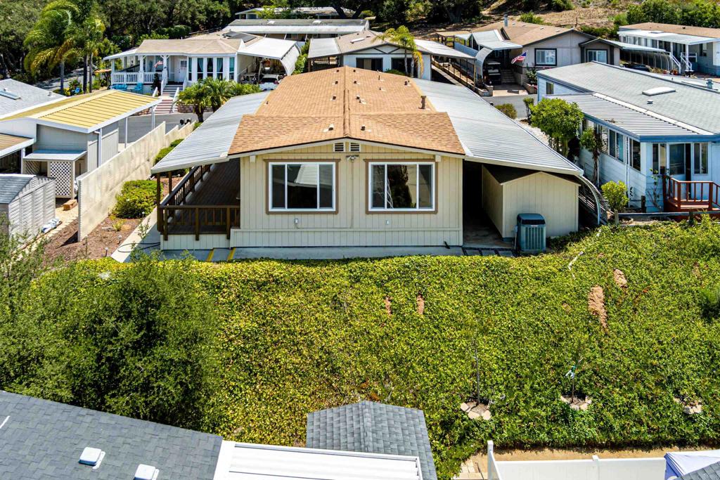 4650 Dulin Road, Unit 119 Fallbrook, CA 92003 - Photo 8 of 49 a aerial view of a house with a yard