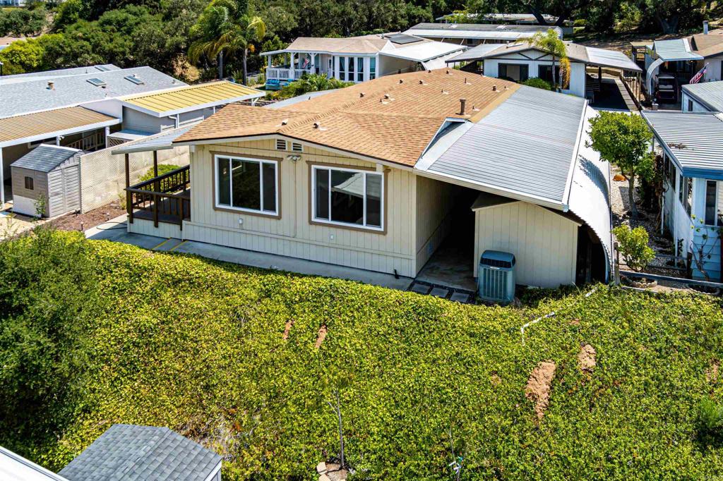 4650 Dulin Road, Unit 119 Fallbrook, CA 92003 - Photo 9 of 49 an aerial view of a house with a yard
