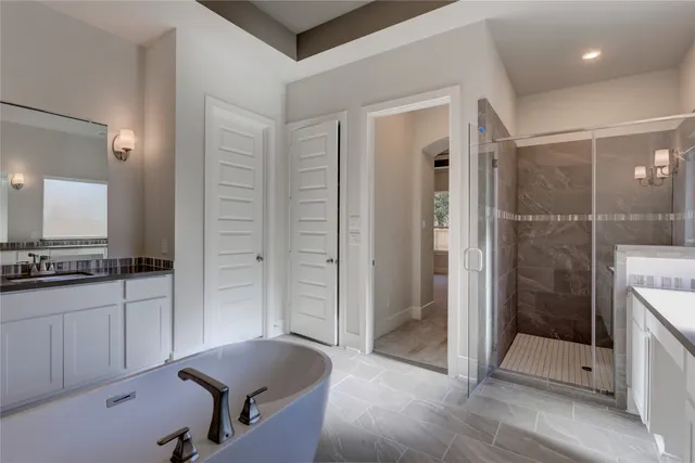 a bathroom with a bath tub