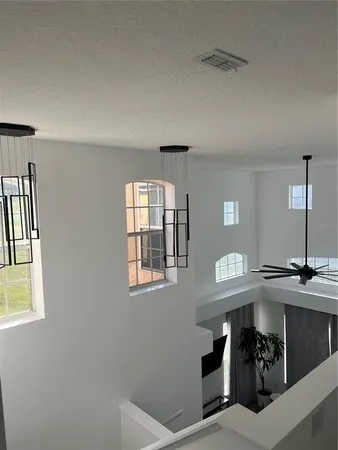 a view of a livingroom with furniture and window