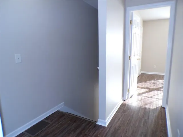 a view of small space with wooden floor