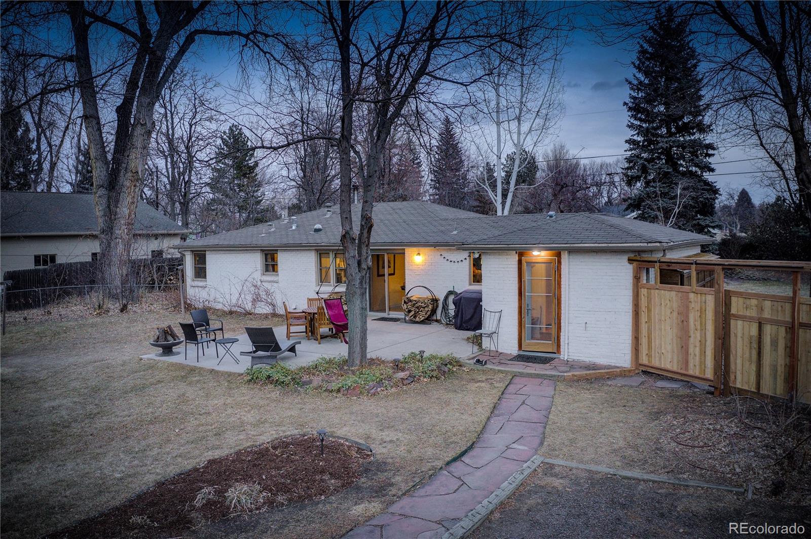 933 Cherryvale Road Boulder, CO 80303 - Photo 24 of 32 a view of a house with backyard and sitting area