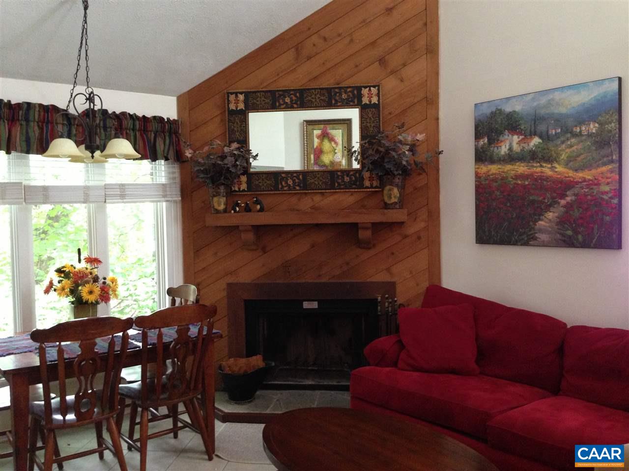 459 Three Ridges, Unit 459 Roseland, VA 22967 - Photo 3 of 11 a living room with furniture and a fireplace