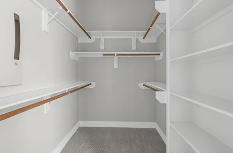 a view of small space with racks on the wall