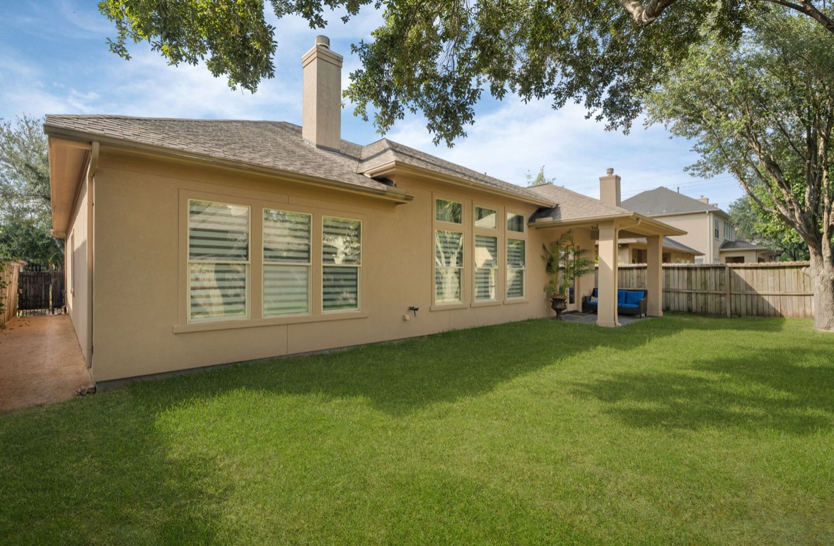 11206 Castille Lane Houston, TX 77082 - Photo 41 of 45 a front view of a house with a garden