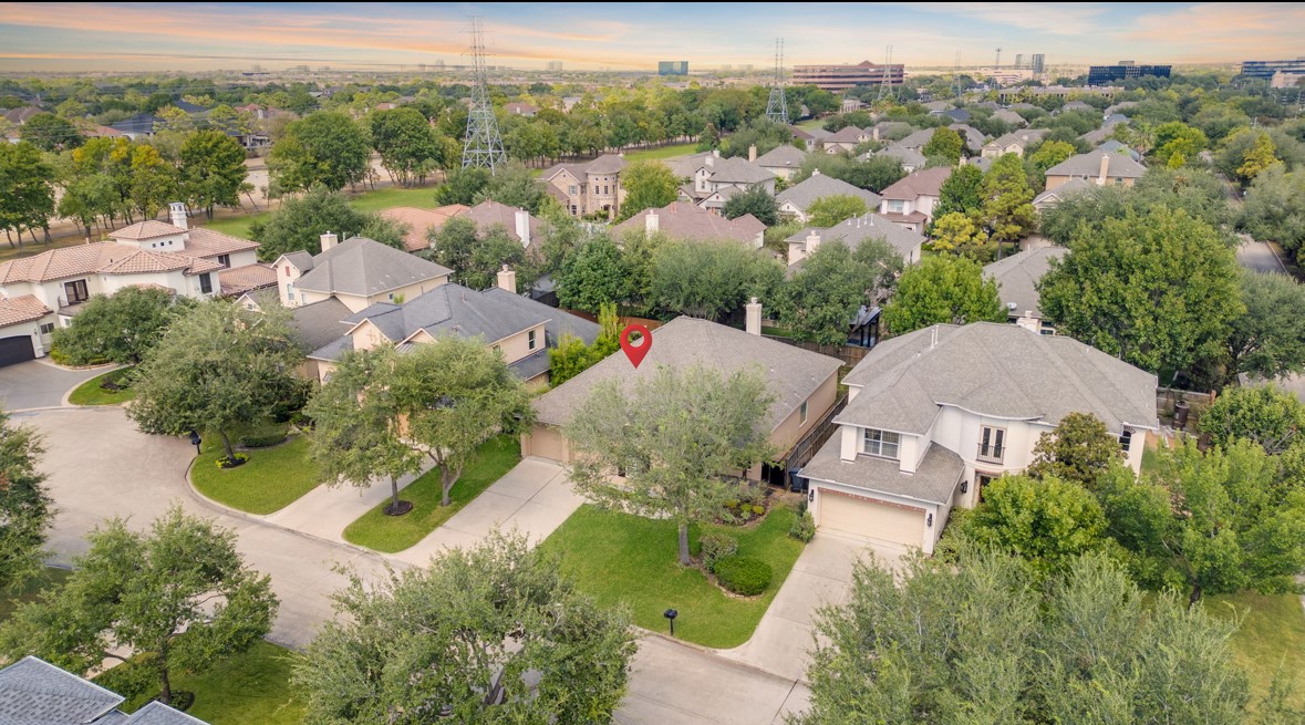 11206 Castille Lane Houston, TX 77082 - Photo 45 of 45 an aerial view of a house with a yard and lake view