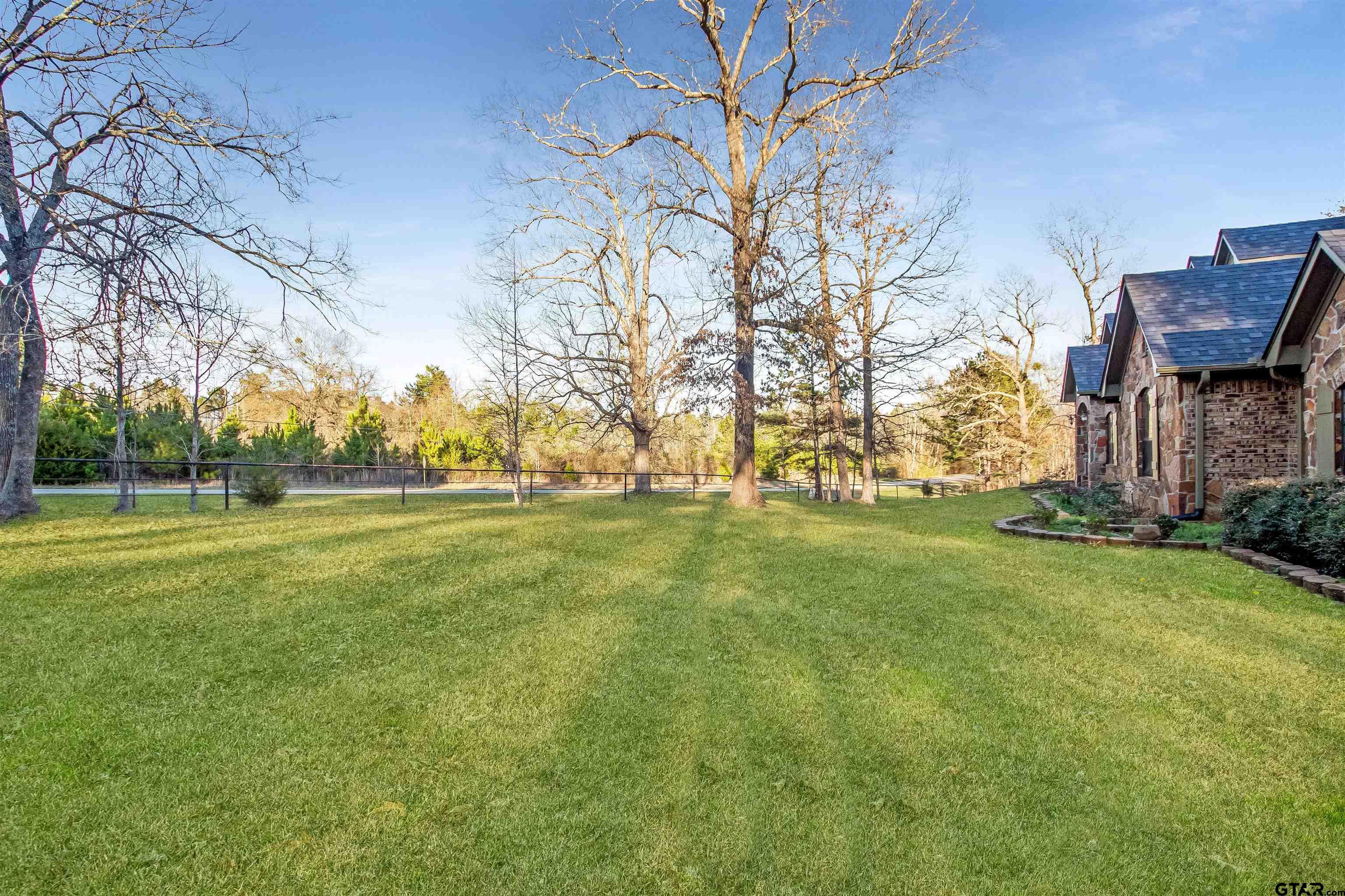 1687 West Point Road Kilgore, TX 75662 - Photo 2 of 41 a view of yard with green space
