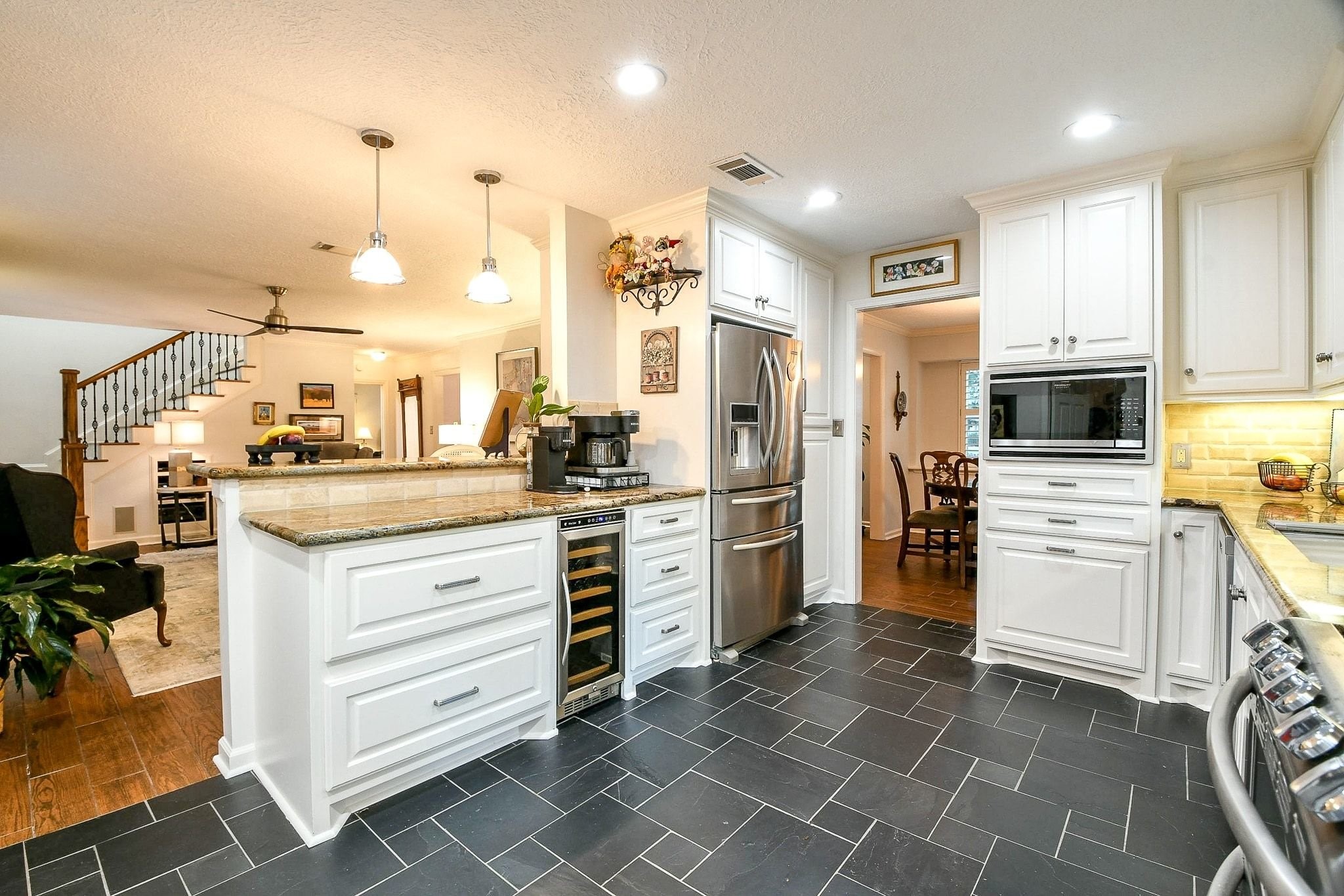 6607 Misty Springs Lane Spring, TX 77379 - Photo 14 of 31 This spacious, open-concept area is perfect for family gatherings and creating lasting memories.