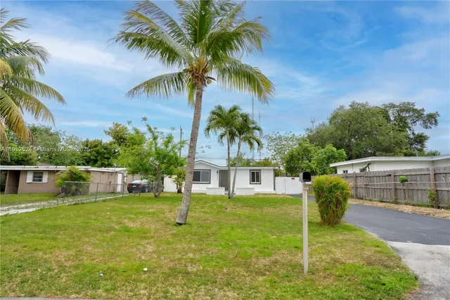 a view of a house with a swimming pool