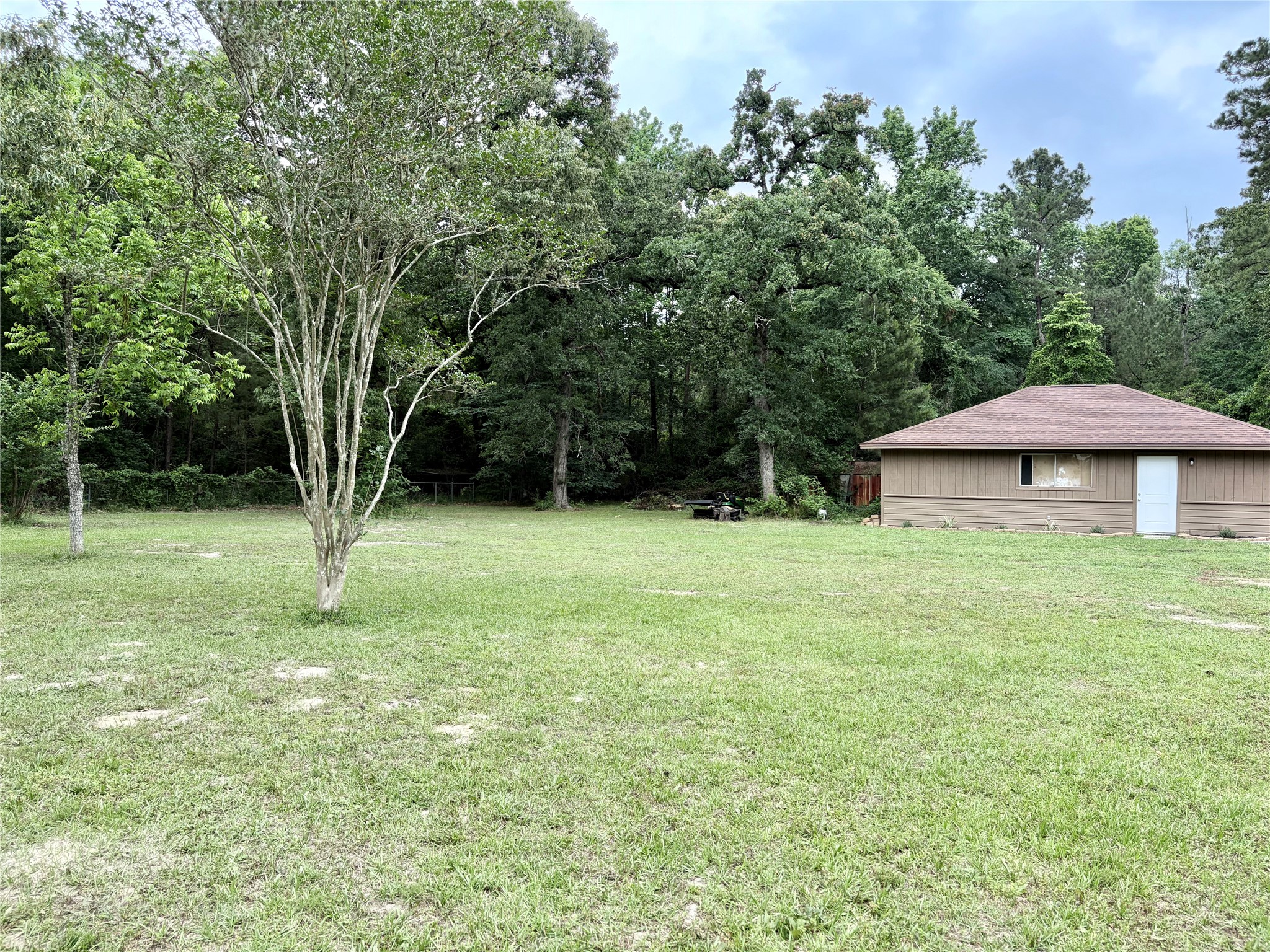 14437 Jack Gibbs Road Willis, TX 77378 - Photo 20 of 20 Oversized garage with space for parking, workshop, and or living quarters.
