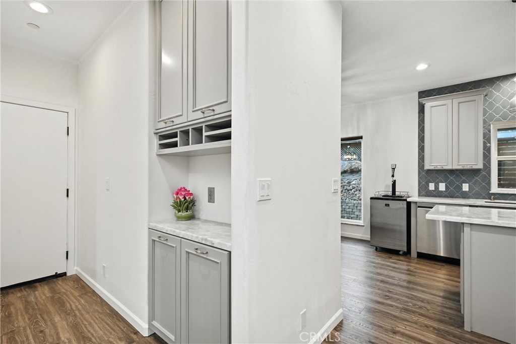 17234 Brookfield Road Hidden Valley Lake, CA 95467 - Photo 19 of 35 a kitchen with a sink cabinets and wooden floor