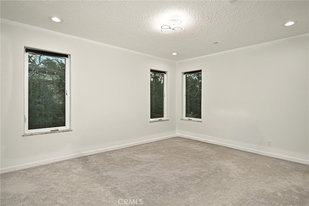 17234 Brookfield Road Hidden Valley Lake, CA 95467 - Photo 25 of 35 an empty room with windows and closet
