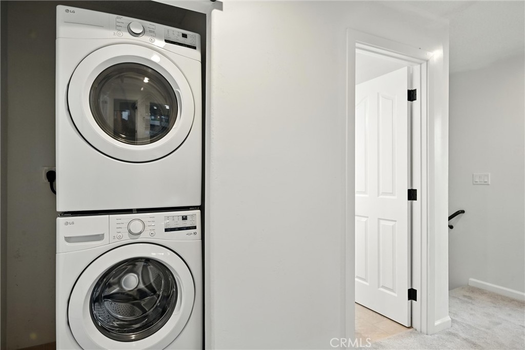 17234 Brookfield Road Hidden Valley Lake, CA 95467 - Photo 28 of 35 a view of a hallway with washer and dryer