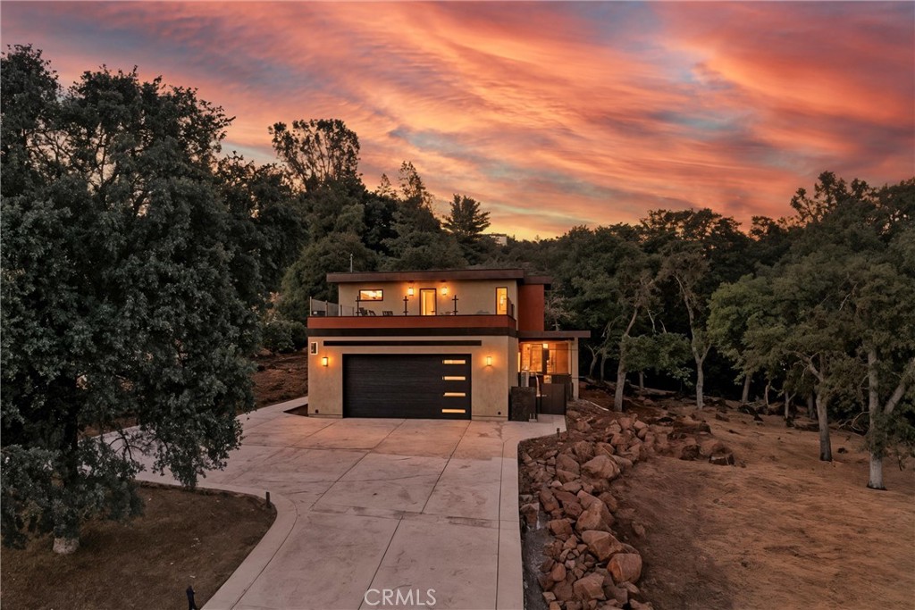 17234 Brookfield Road Hidden Valley Lake, CA 95467 - Photo 35 of 35 a view of a fireplace with a trees in the background