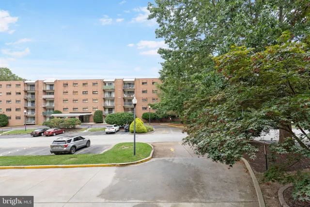a lobby with furniture and floor to ceiling window