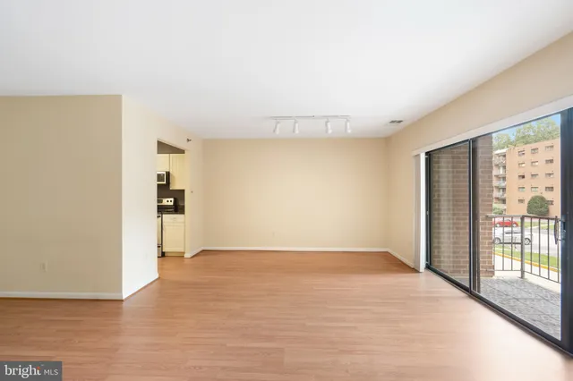 a view of a livingroom with wooden floor
