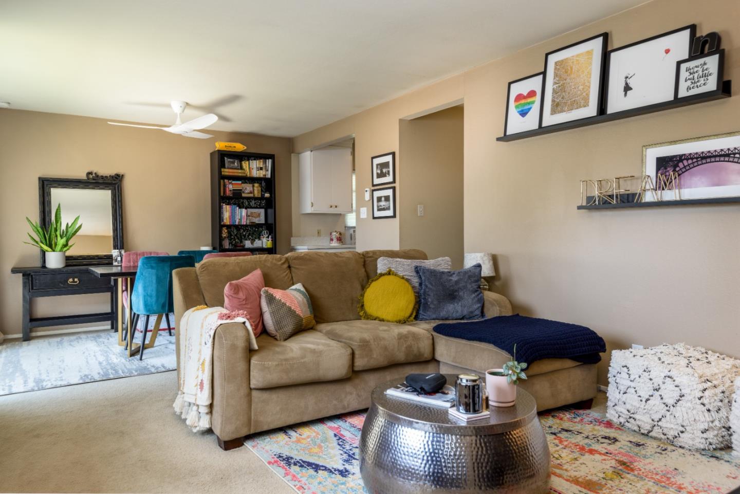 1437 Floribunda Avenue Burlingame, CA 94010 - Photo 17 of 35 a living room with furniture and painting on the wall