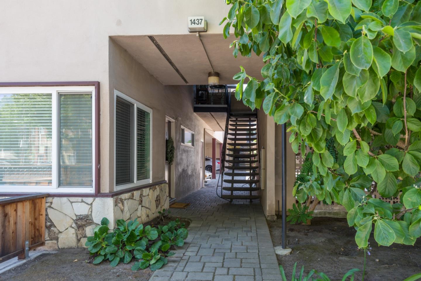 1437 Floribunda Avenue Burlingame, CA 94010 - Photo 2 of 35 a front view of a house with plants