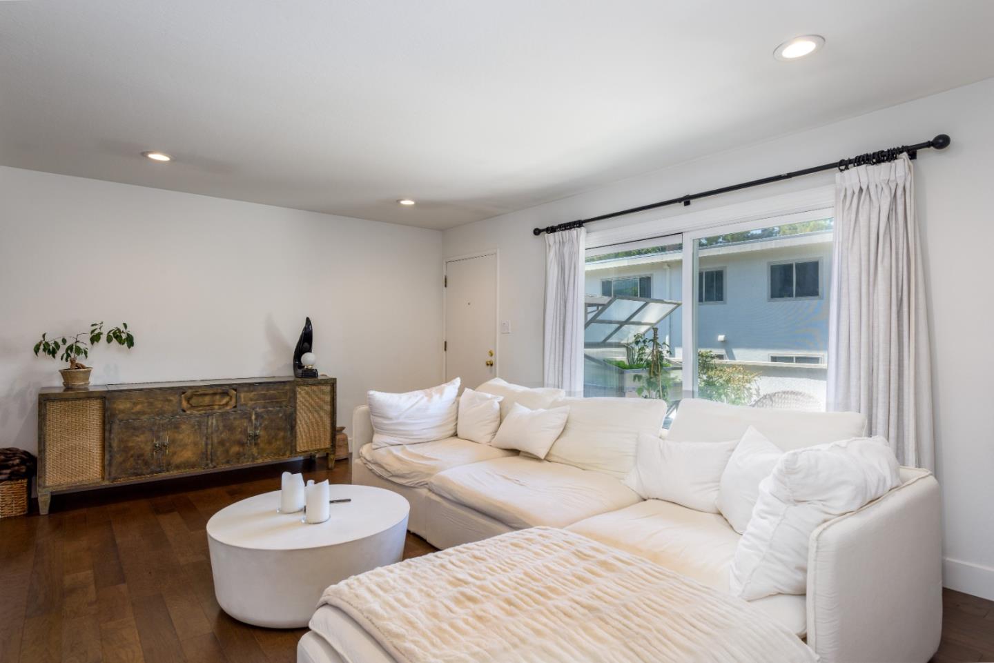 1437 Floribunda Avenue Burlingame, CA 94010 - Photo 4 of 35 a living room with furniture and a wooden floor