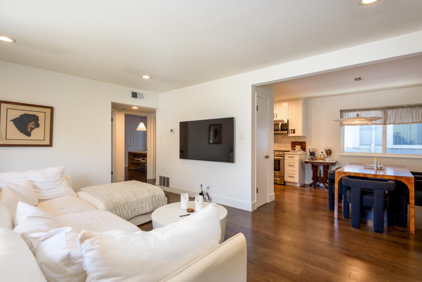 1437 Floribunda Avenue Burlingame, CA 94010 - Photo 5 of 35 a living room with furniture and a flat screen tv