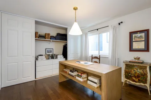 a room with furniture and window