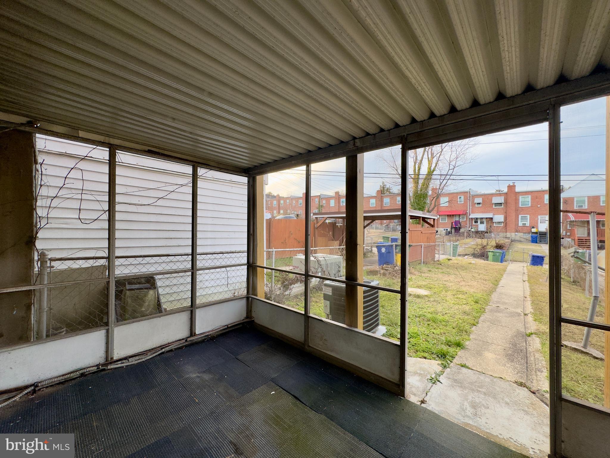 712 Bethnal Road Baltimore, MD 21229 - Photo 11 of 20 a view of a porch with wooden floor
