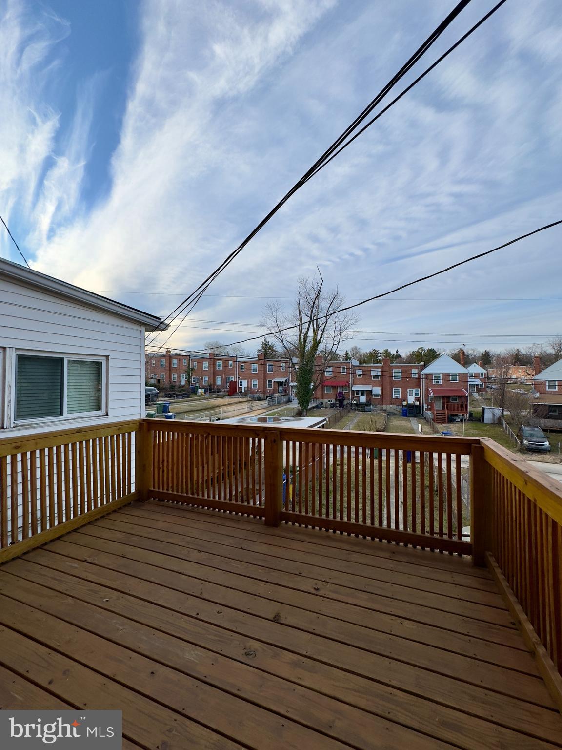 712 Bethnal Road Baltimore, MD 21229 - Photo 4 of 20 a view of balcony with wooden floor