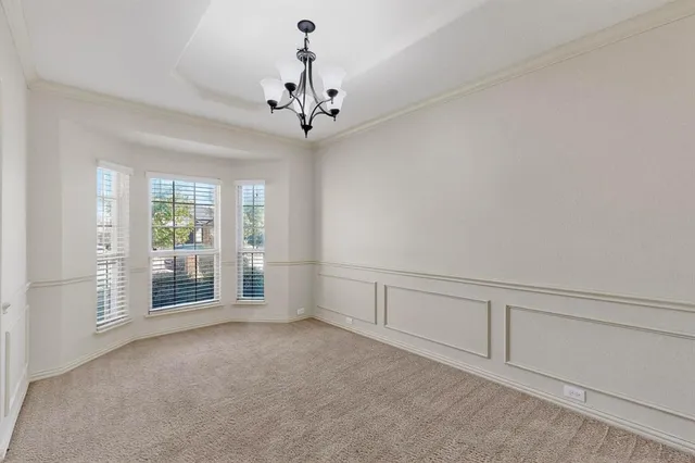 a view of a livingroom with a chandelier