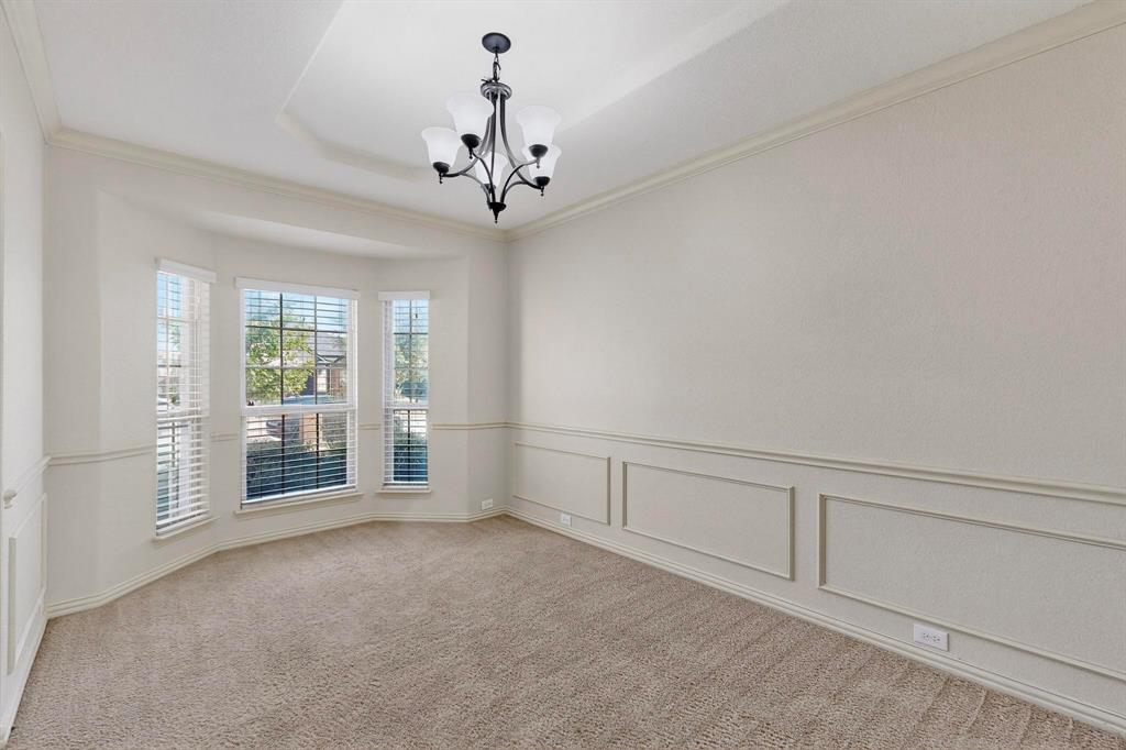 9329 Turtle Pass Fort Worth, TX 76177 - Photo 14 of 31 a view of a livingroom with a chandelier