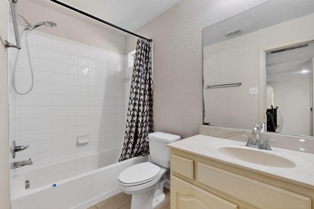 9329 Turtle Pass Fort Worth, TX 76177 - Photo 25 of 31 a bathroom with a sink toilet and shower