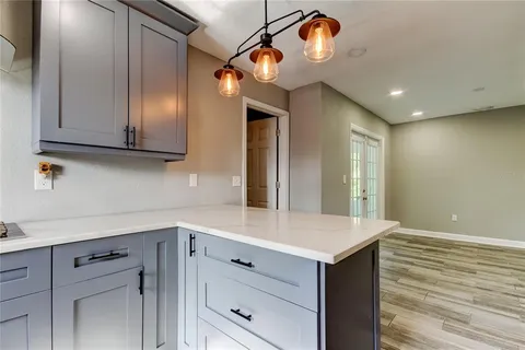 a view of kitchen and windows