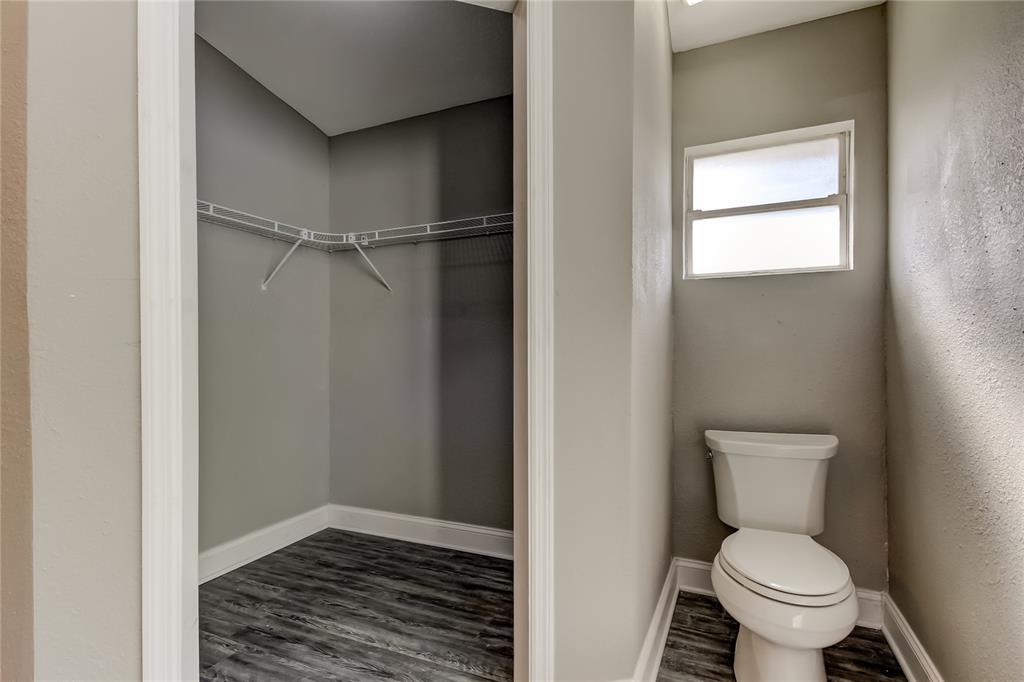 8330 Lafitte Drive Hudson, FL 34667 - Photo 25 of 34 a bathroom with a toilet and a shower