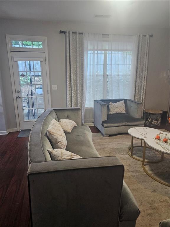 5639 Chatham Circle Northwest Norcross, GA 30071 - Photo 7 of 16 a living room with furniture and a large window