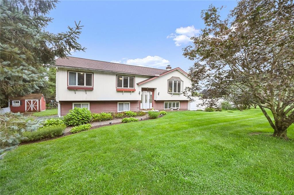 9 Jotham Road New Milford, CT 06776 - Photo 1 of 1 a front view of a house with a yard