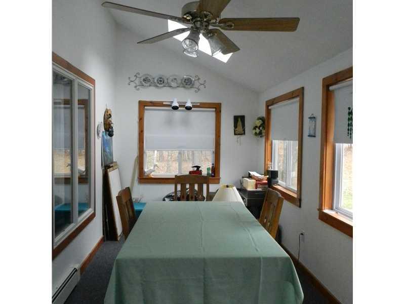 156 Hight Road Biddeford, ME 04005 - Photo 13 of 22 Other. Front enclosed sunporch with...
