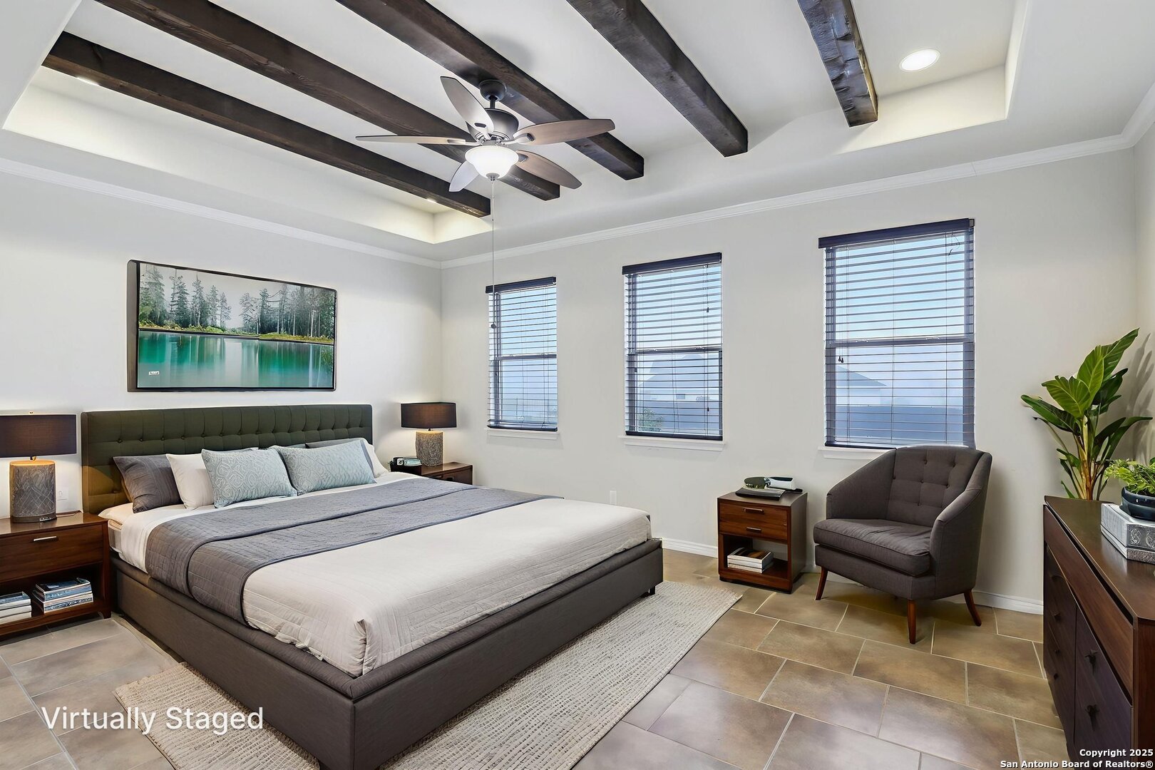 138 Gable Street Kyle, TX 78640 - Photo 17 of 51 a bedroom with a bed couch and windows