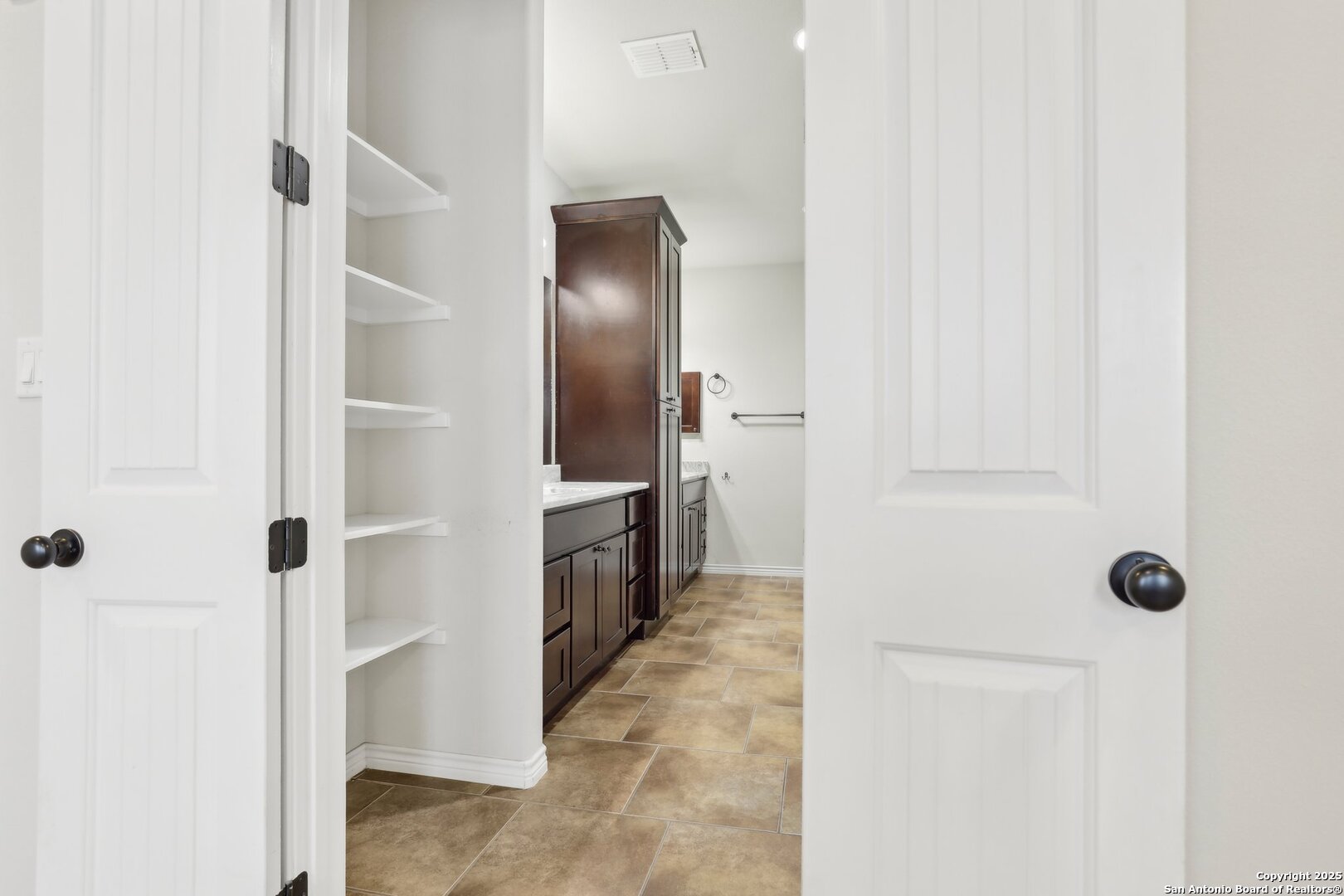 138 Gable Street Kyle, TX 78640 - Photo 18 of 51 a view of a hallway with a white walls