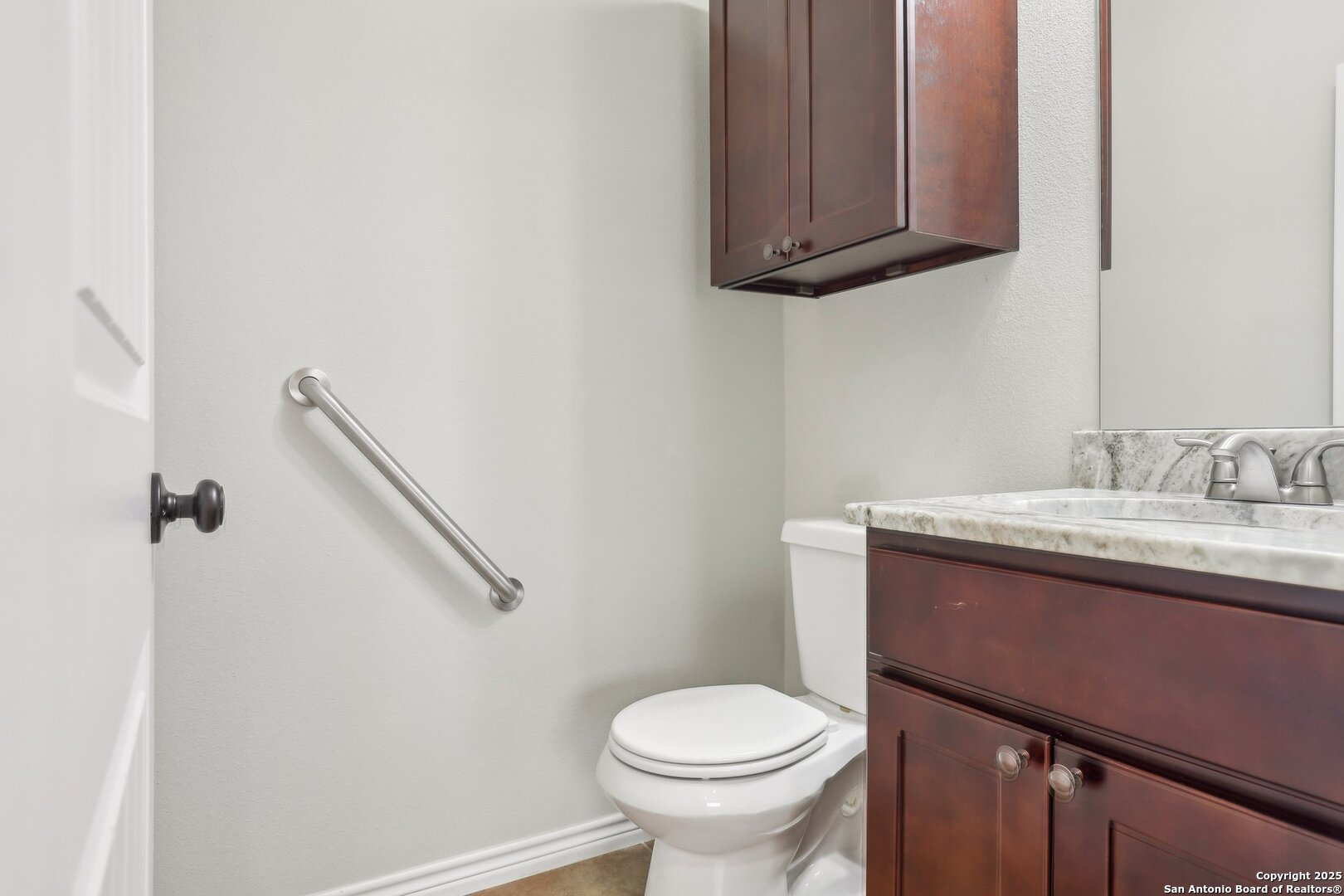 138 Gable Street Kyle, TX 78640 - Photo 23 of 51 a bathroom with a sink toilet and vanity