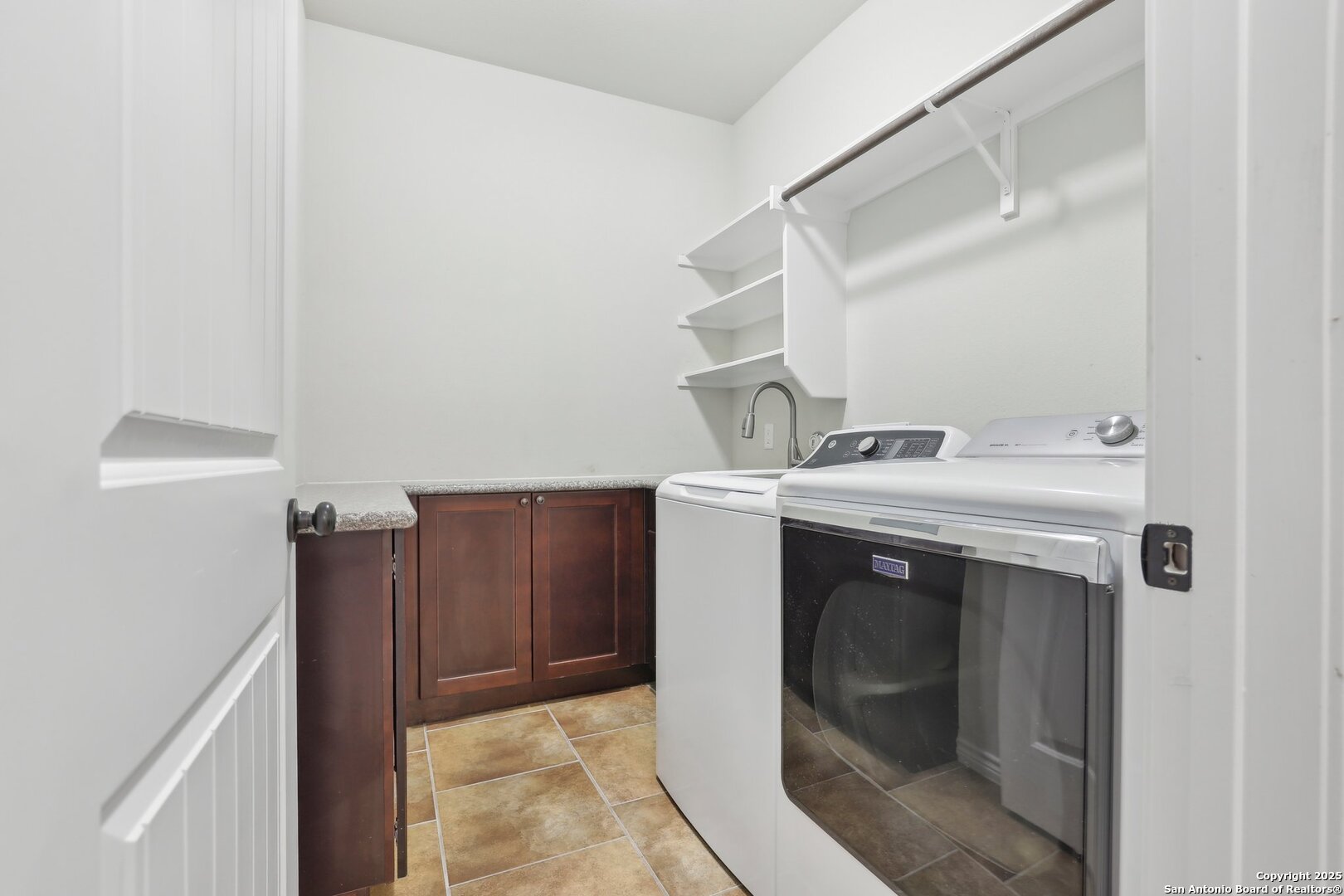 138 Gable Street Kyle, TX 78640 - Photo 26 of 51 a utility room with dryer and washer