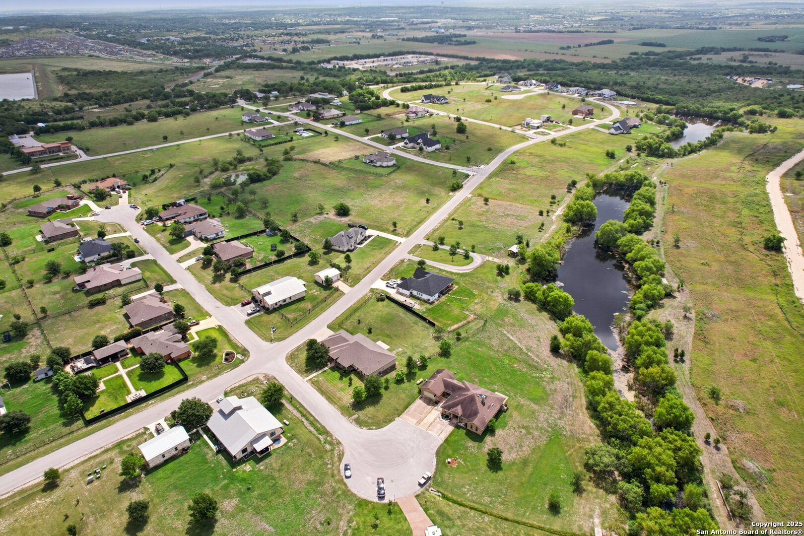 138 Gable Street Kyle, TX 78640 - Photo 48 of 51 an aerial view of residential houses with outdoor space