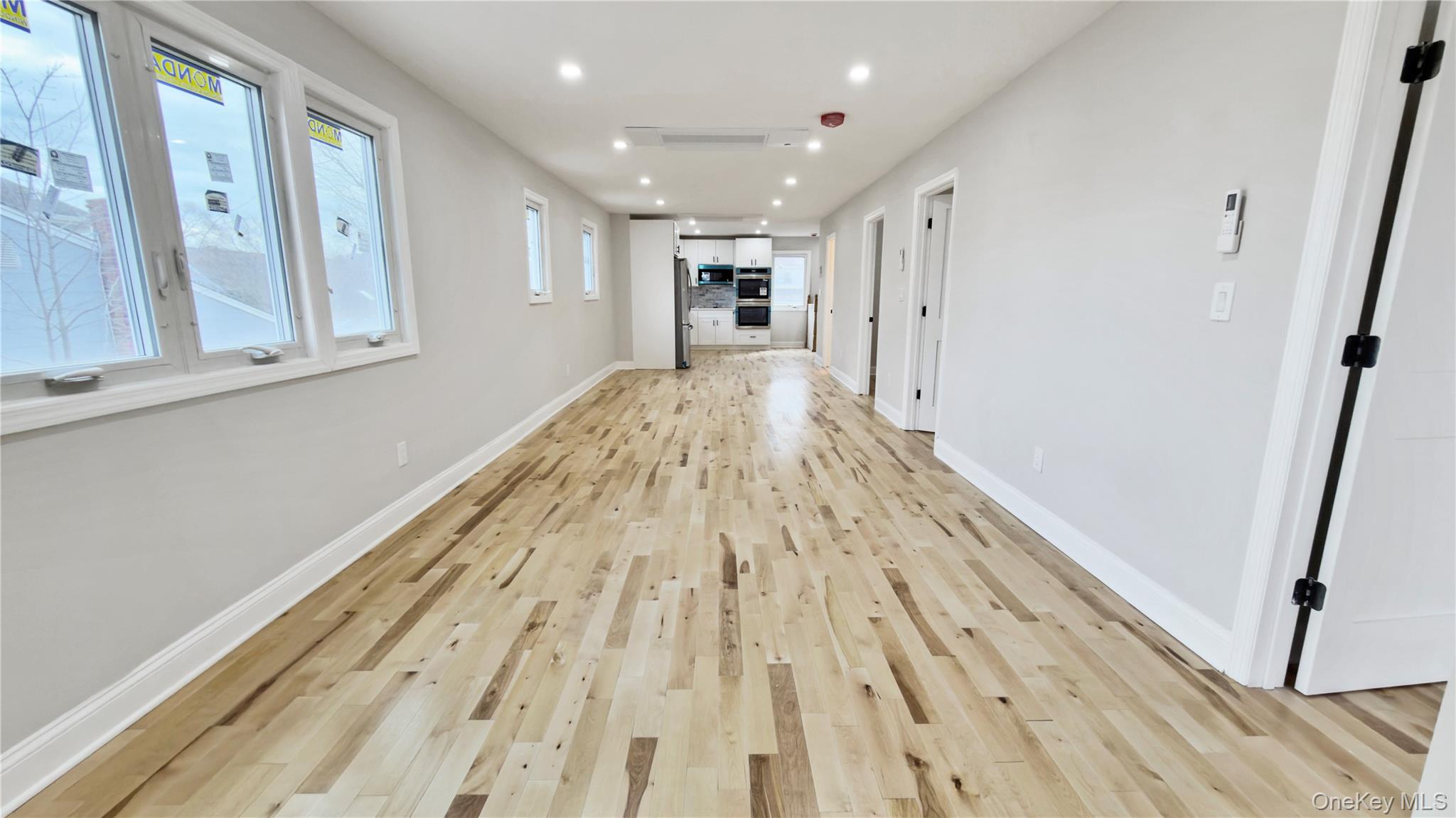37 Deal Road Island Park, NY 11558 - Photo 14 of 50 Hall featuring recessed lighting and light wood-style floors
