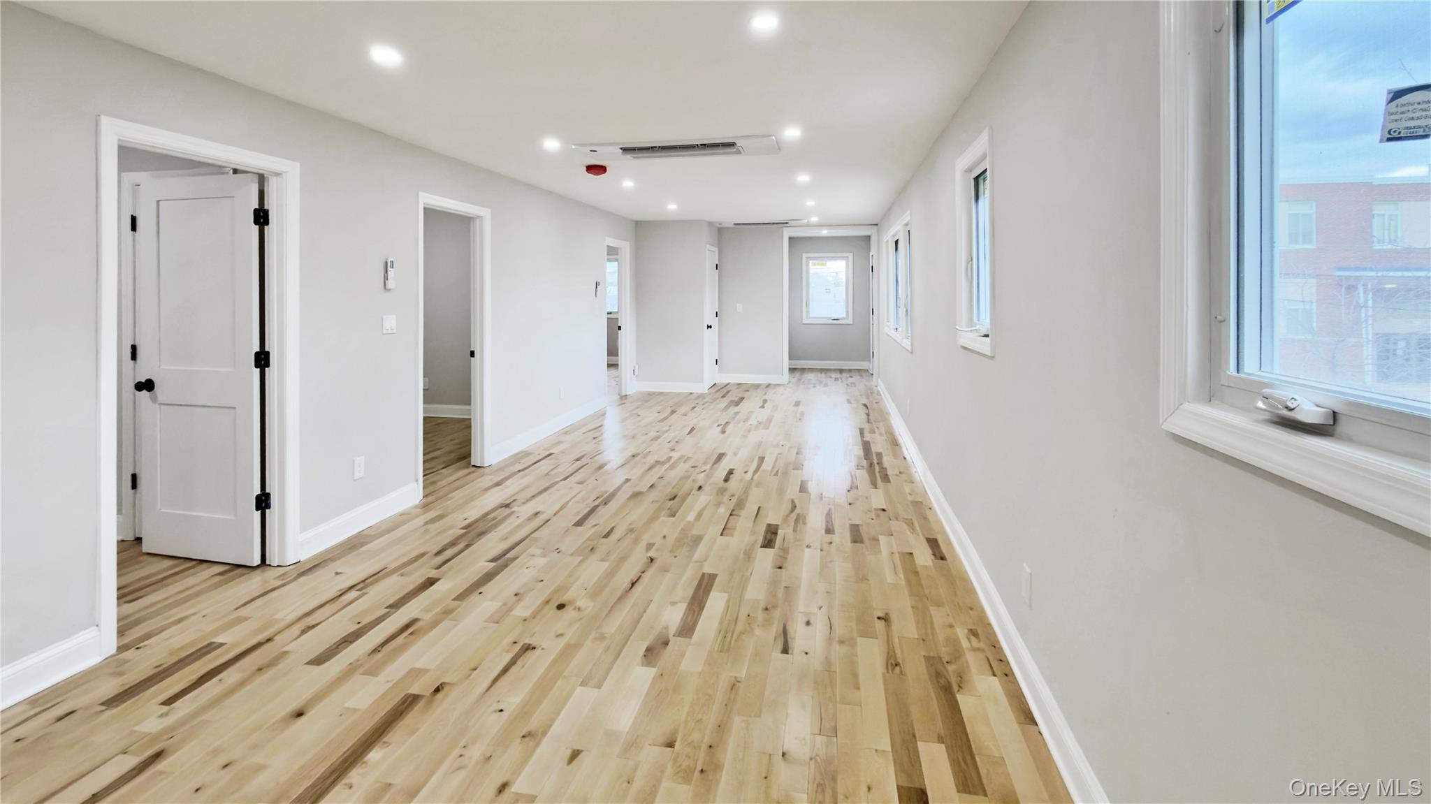 37 Deal Road Island Park, NY 11558 - Photo 15 of 50 Unfurnished room with recessed lighting and light wood-style floors