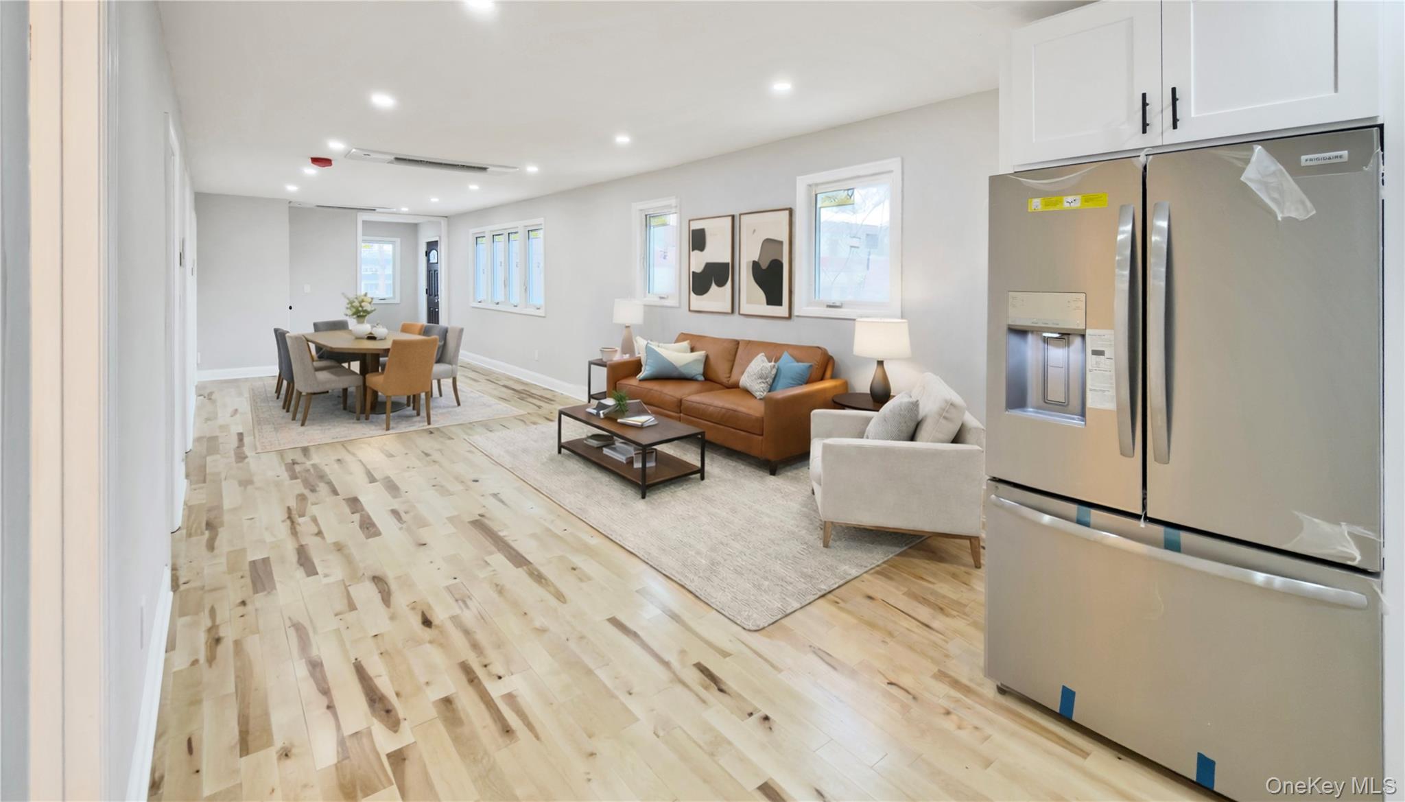 37 Deal Road Island Park, NY 11558 - Photo 24 of 50 Living room featuring recessed lighting, light wood-type flooring, and plenty of natural light