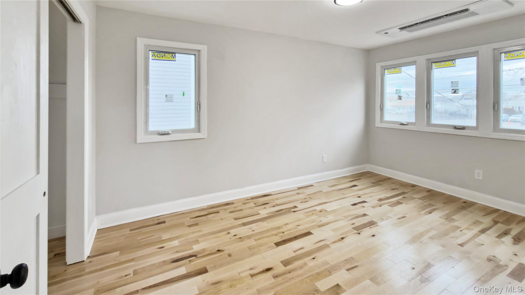 37 Deal Road Island Park, NY 11558 - Photo 25 of 50 Unfurnished bedroom featuring light wood finished floors and a closet