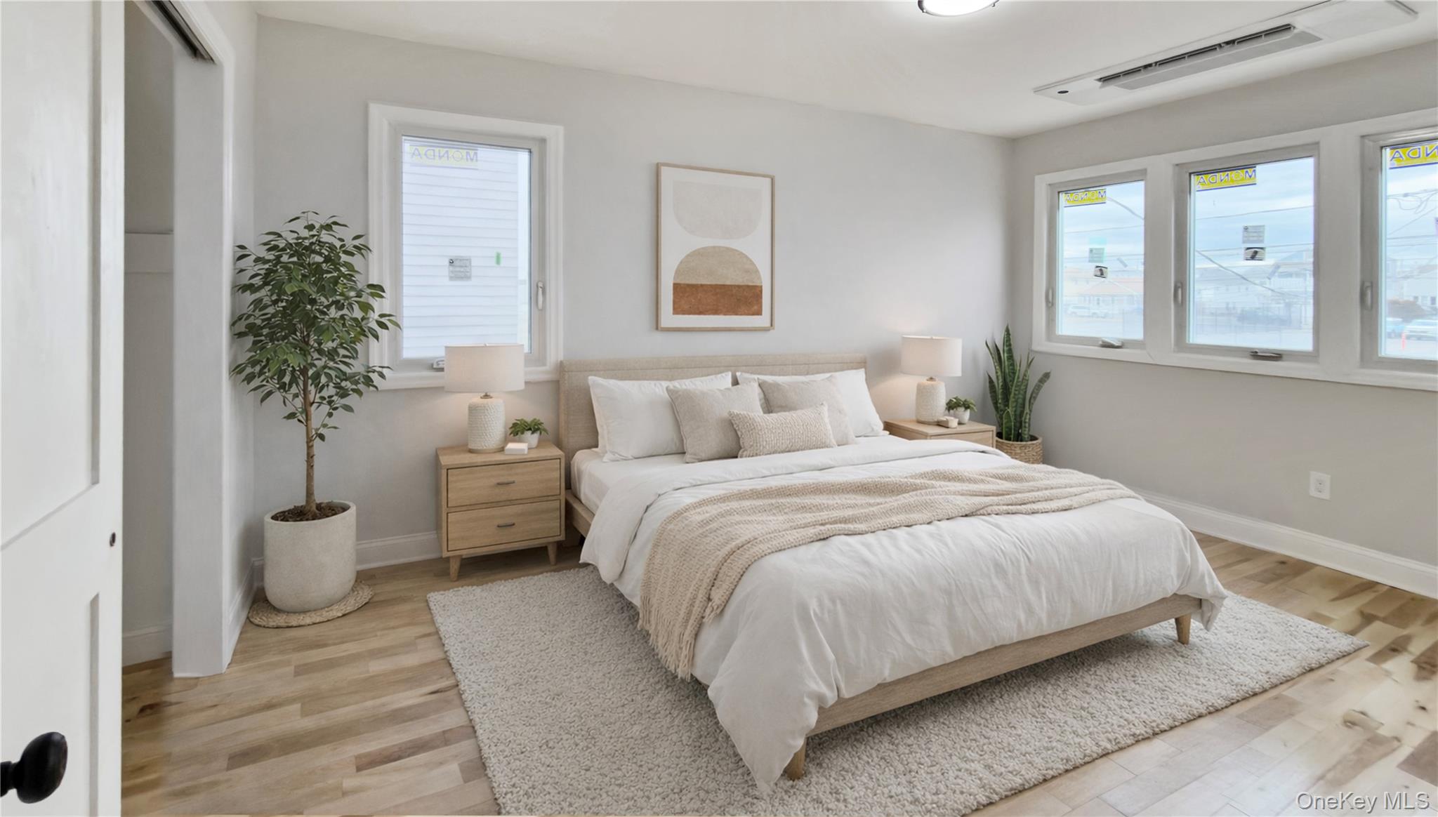 37 Deal Road Island Park, NY 11558 - Photo 26 of 50 Bedroom featuring light wood-style flooring and baseboards