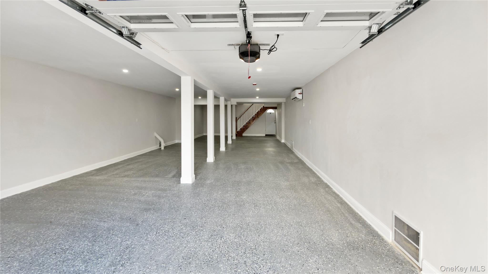 37 Deal Road Island Park, NY 11558 - Photo 36 of 50 Garage featuring recessed lighting and a garage door opener