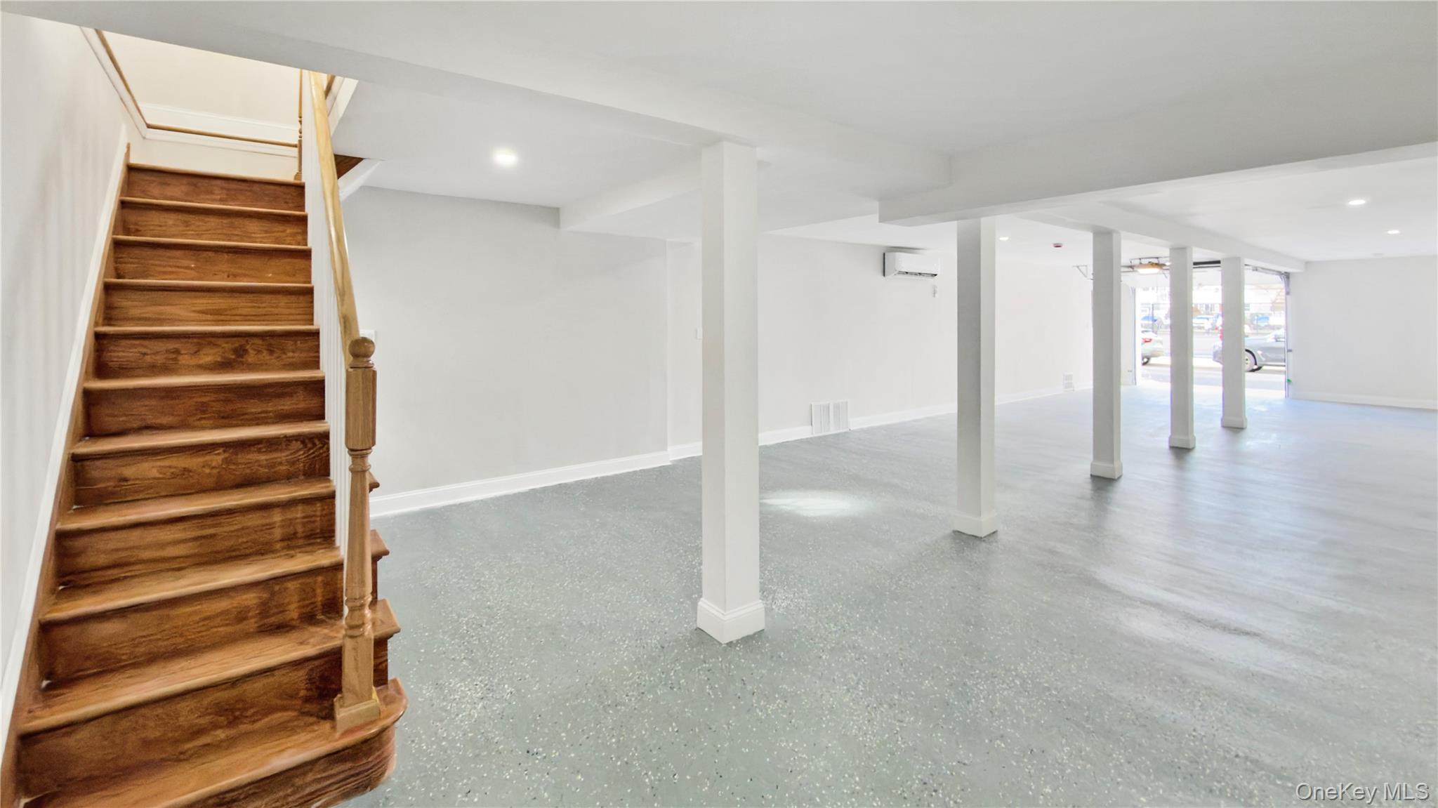 37 Deal Road Island Park, NY 11558 - Photo 38 of 50 Basement featuring stairway and recessed lighting