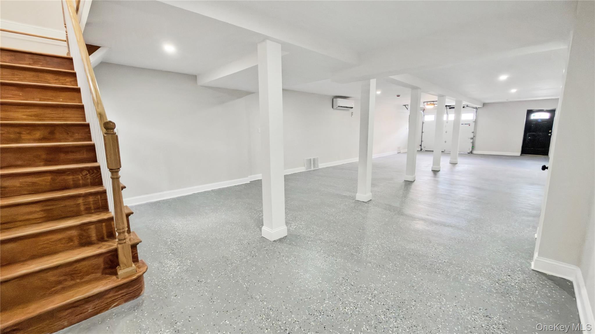 37 Deal Road Island Park, NY 11558 - Photo 41 of 50 Basement featuring stairway and recessed lighting